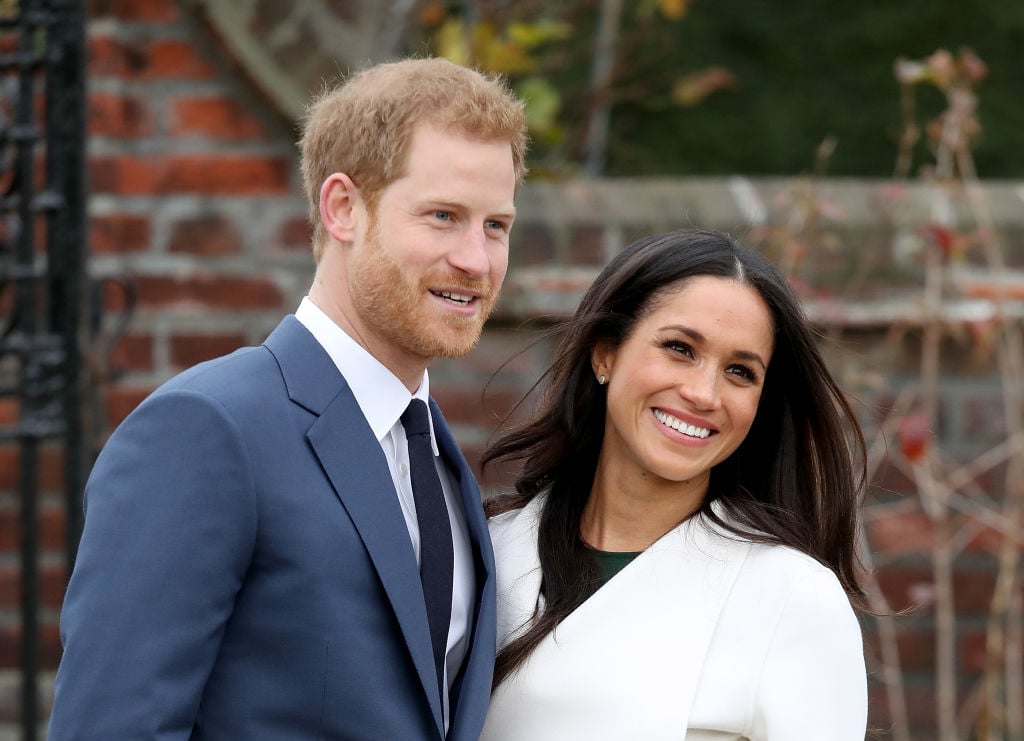Prince Harry and actress Meghan Markle during an official photocall to announce their engagement at The Sunken Gardens at Kensington Palace on November 27, 2017 in London, England. Prince Harry and Meghan Markle have been a couple officially since November 2016 and are due to marry in Spring 2018.